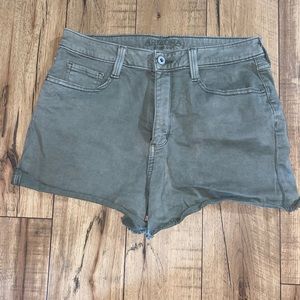 green jean shorts